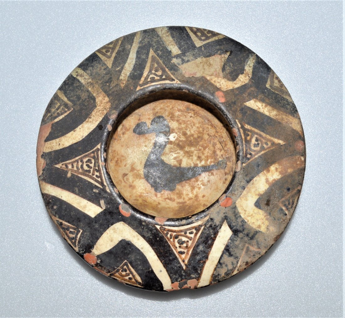 ISLAMIC SAMANID NISHAPURI POTTERY BOWL 10TH CENTURY: ANCIENT ISLAMIC SAMANID NISHAPURI POTTERY BOWL 10TH CENTURY, With Beautiful Bird image on the center of the bowl, And With Black & Red Painted.