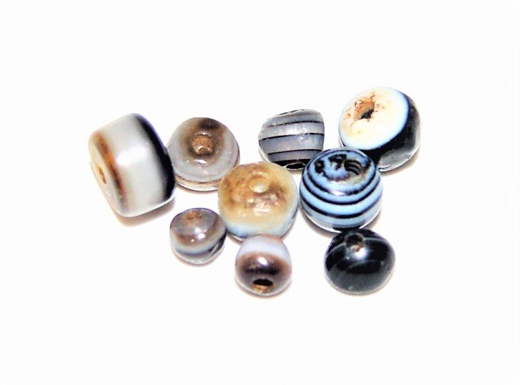 A GROUP OF ANCIENT DZI SULAIMANI BANDED AGATE BEADS (1 of 2)