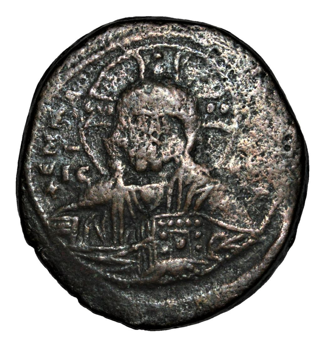 ANCIENT BYZANTINE. ANONYMOUS CHRIST BUST Ã† FOLLIS: ANCIENT BYZANTINE. Anonymous Type A2. 976-1025 AD. Ã† Follis . Constantinople mint. Facing nimbate bust of Christ / +IhSUSXRISTUS bASILEUS bASILE'; cross of dots above and below.