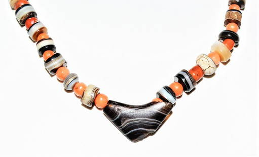 ANCIENT SULAIMANI BANDED AGATE BEADS NECKLACE 1ST CENTURY BC: A Rare Ancient Agate Suleimani Dzi Chung Beads Necklace, around 1500-2000 years old, Most Ancient beads except With Some beads from Antique Coral and Agate SuleimaniBeads.A conversation with a