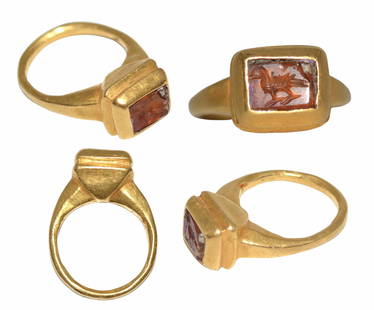 IMPORTANT ANCIENT ROMAN GARNET GOLD RING 1ST-2ND CENTURY: IMPORTANT & VERY RARE SHAPED ANCIENT ROMAN GARNET GOLD RING, CIRCA 1ST-2ND CENTURY, Of very Rare & special designed gold ring set with a red cut garnet intaglio with Bird image.