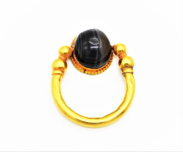 ANCIENT AGATE SULAIMANI BEAD FITTED IN 18K GOLD RING: AN ANCIENT AGATE SULAIMANI DZI BEAD 1500+ YEARS OLD SET IN NEW 18K GOLD RING.