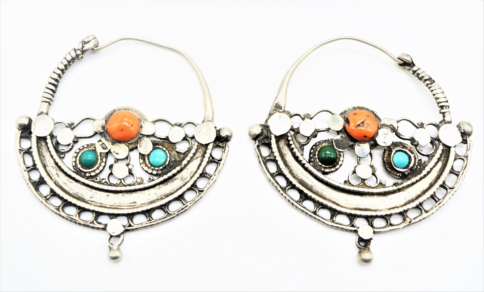A VINTAGE PAIR OF BUKHARA TURKMEN SILVER EARRINGS: A VINTAGE PAIR OF BUKHARA TURKMEN SILVER EARRINGS, PROBABLY BUKHARA CENTRAL ASIA. Of Very UZBEK orTURKMEN Style, With Turquoise & Coral Set. Of Half Circle Shape, Unique Design & Stle.