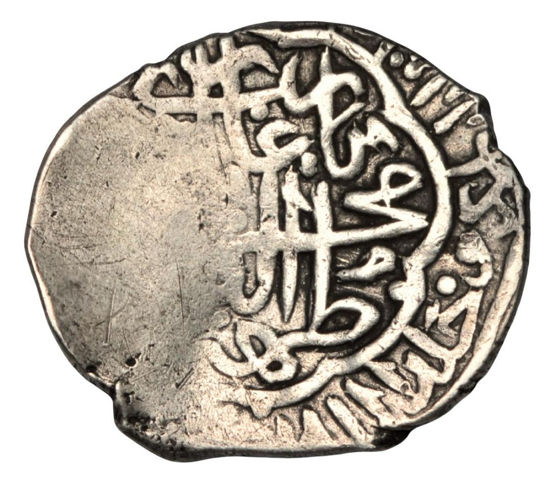 ISLAMIC INDIA BABUR SILVER COIN THE FOUNDER OF MUGHAL EMPIRE: A RARE ISLAMIC, INDIA, Mughal Empire. Zahir al-Din Muhammad Babur. AH 932-937 / AD 1526-1530. AR Mithqal shahrukhi, Possibly Kabul mint. Kalima within ornate circular frame; titles of Rashidun in oute