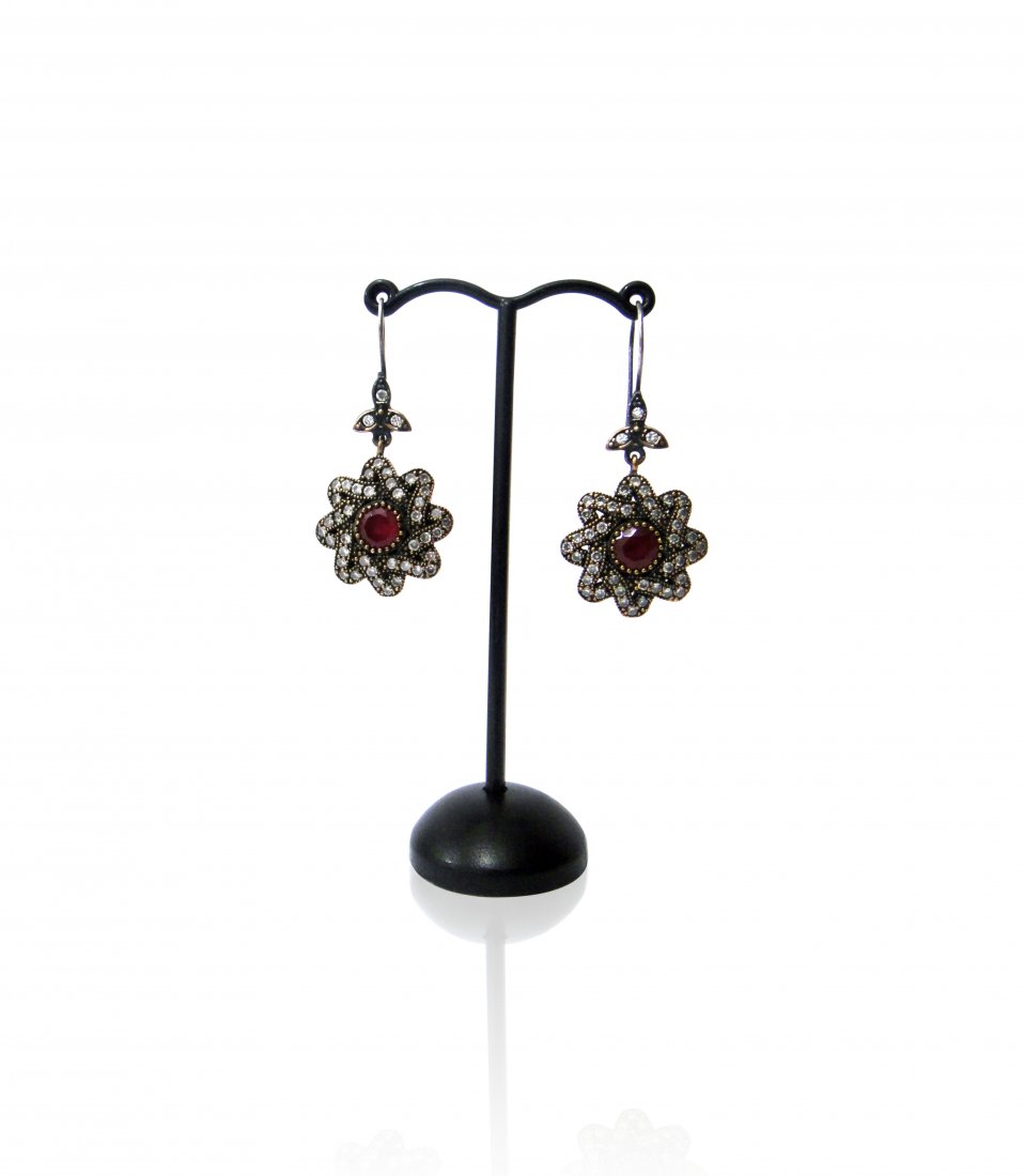 A Pair Of Star Shaped Ruby Sterling Silver Earring: A Pair Of Star Shaped Heated Ruby Zircon Sterling Silver Earrings .