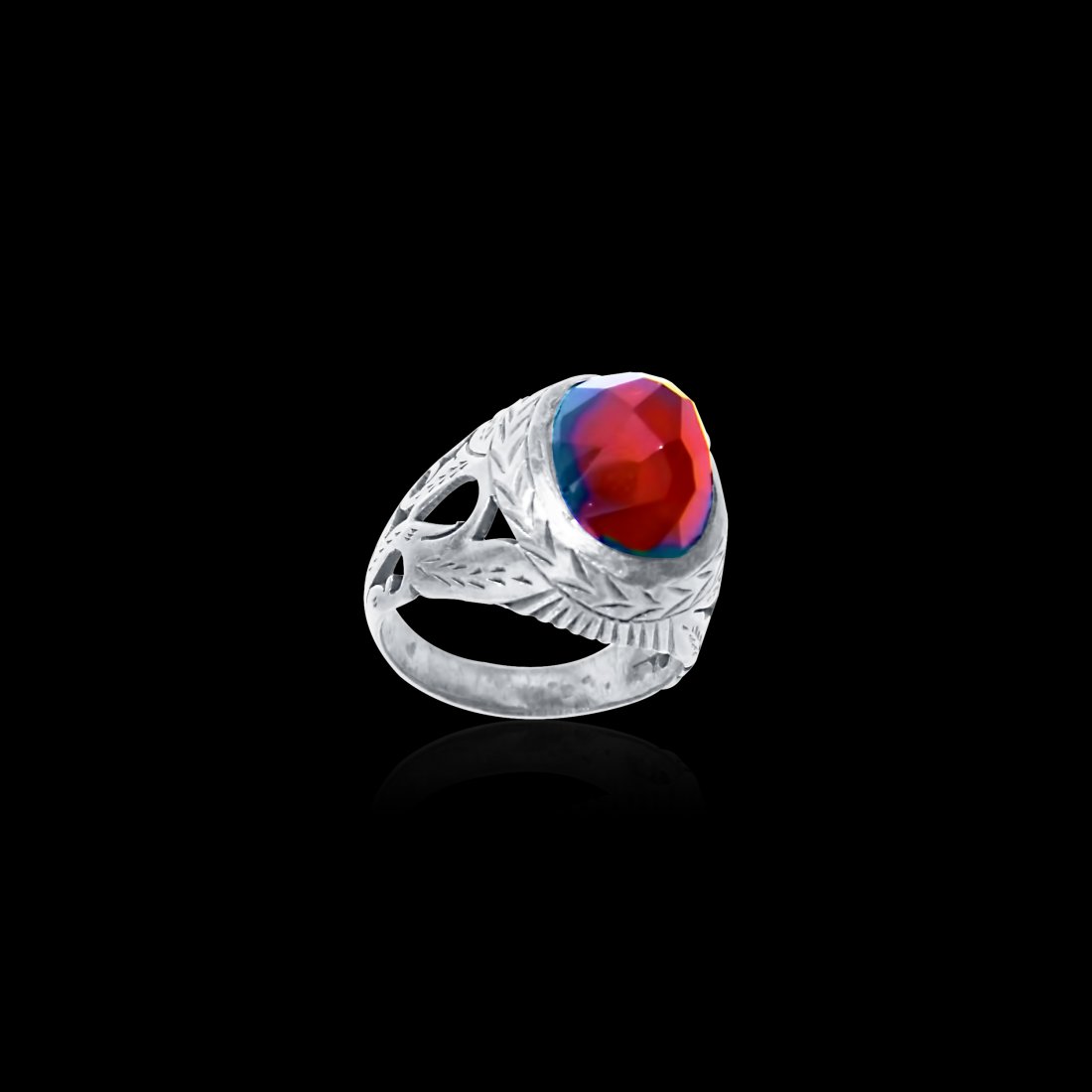 A Persian Oval Cut Red Garnet Silver Ring 19th Century (1 of 1)