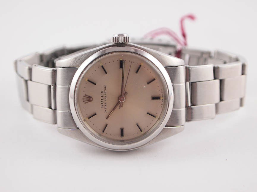 Rolex Midsize SS Oyster Perpetual Watch.: Rolex Midsize Oyster Perpetual Watch. Stainless Steel. Automatic Movement. Deployment Buckle. Swiss Made. Beautiful Watch.