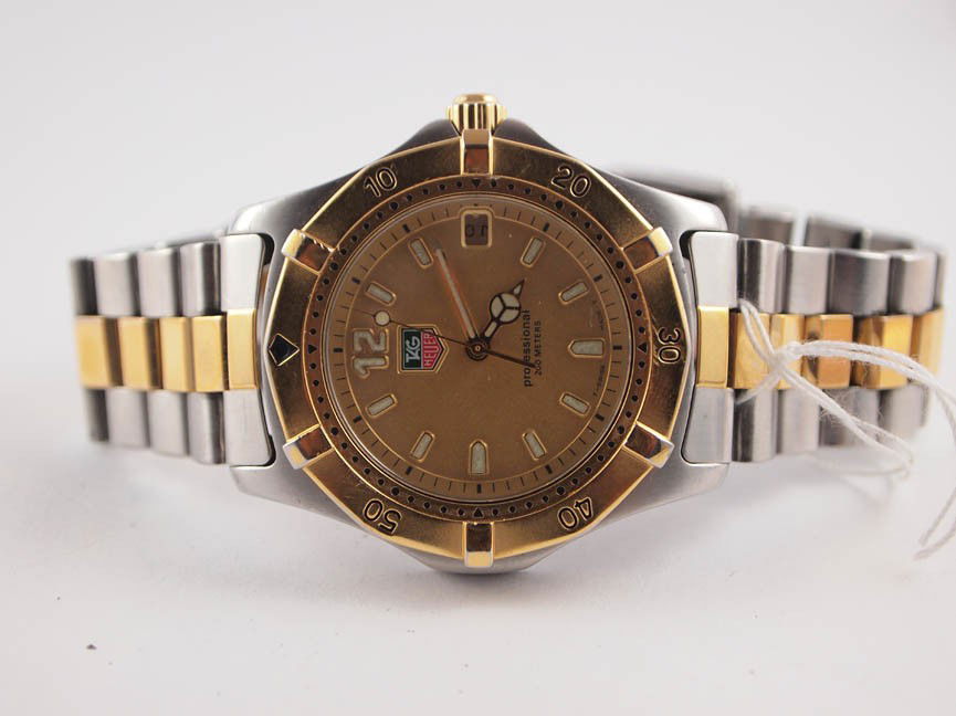 Tag Heuer Mens 2-Tone Watch: Tag Heuer Mens 2-Tone Watch. Professional. Date. Stainless Steel. Swiss made.