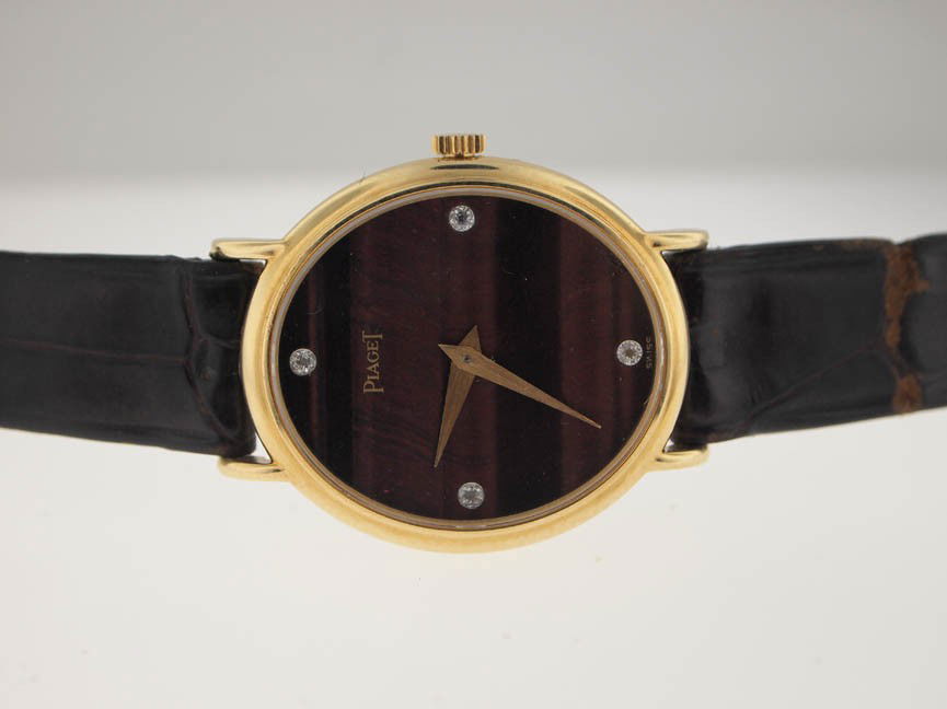 Piaget Ladies 18k Gold Diamond Watch.: Piaget Ladies 18k Gold Diamond Watch. Piaget, Ladies, 18k Gold, Diamond Dial, Leather Strap, Swiss Made, Beautiful Condition, Leather Strap Shows Wear, Pre-Owned.
