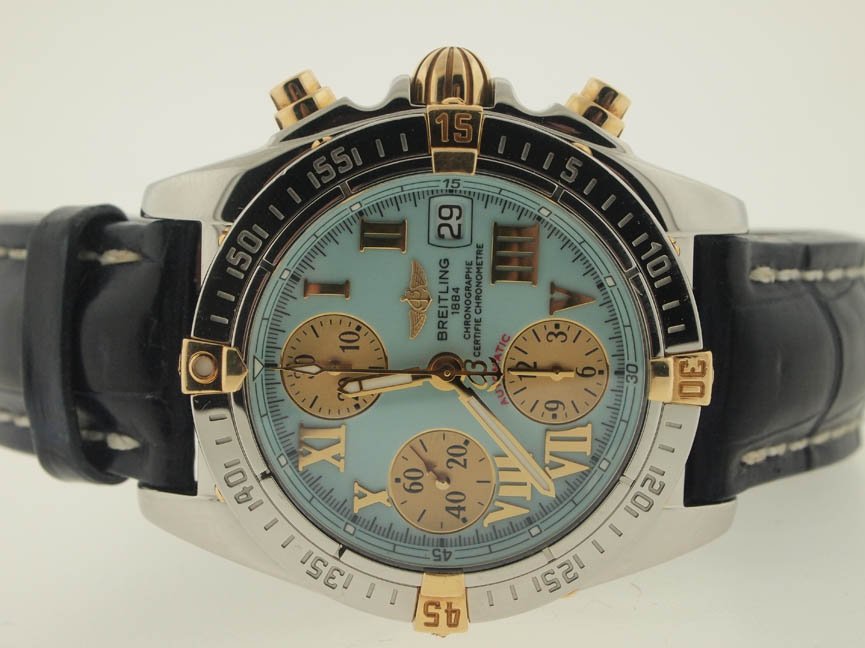 Breitling Mens 18k and SS Cockpit Chronograph. Box: Breitling Mens 18k and SS Cockpit Chronograph. Box/Papers. Breitling, Mens, 18k Gold, Stainless Steel, Cockpit, Chronograph, Comes with Box and Papers, Swiss Made.