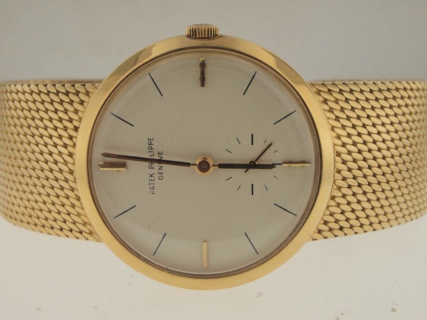 Patek Philippe 18k Gold Manual Wind Dress Watch.: Patek Philippe 18k Gold Manual Wind Dress Watch. Patek Philippe, Mens, 18k Gold, Manual Wind, Original Patek Philippe Mesh Bracelet, Separate Seconds Hand, Swiss Made.