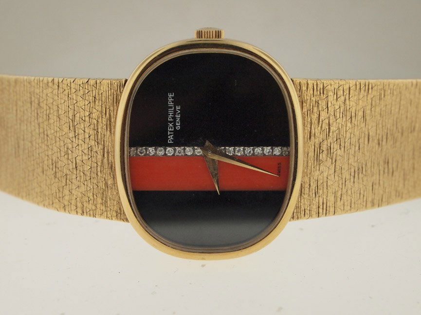 Patek Philippe Mens 18k Gold with Diamonds.: Patek Philippe Mens 18k Gold with Diamonds. Patek Philippe, Mens, 18k Gold, Original Diamond Dial, Aftermarket Diamond initials be removed at any time, Dress Watch, 32x27mm, Rare, Swiss Made.