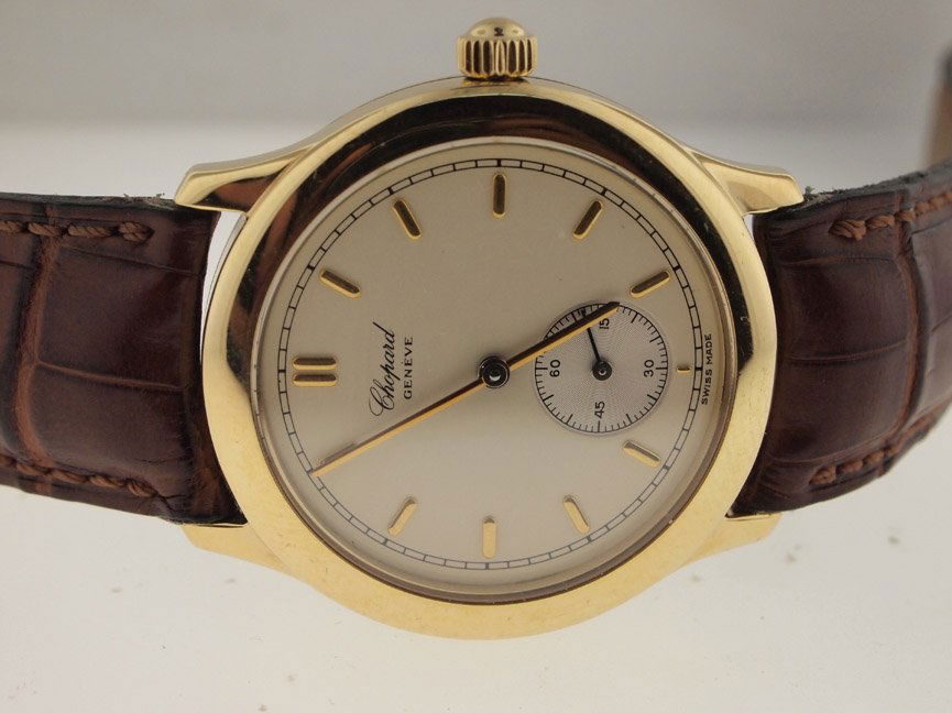 Chopard Mens 18k Gold Skeleton Dress Watch.: Chopard Mens 18k Gold Skeleton Dress Watch. Chopard, Mens, 18k Gold, Skeleton Back, Manual Wind, Separate Seconds, Leather Strap, Dress Watch, Swiss Made.