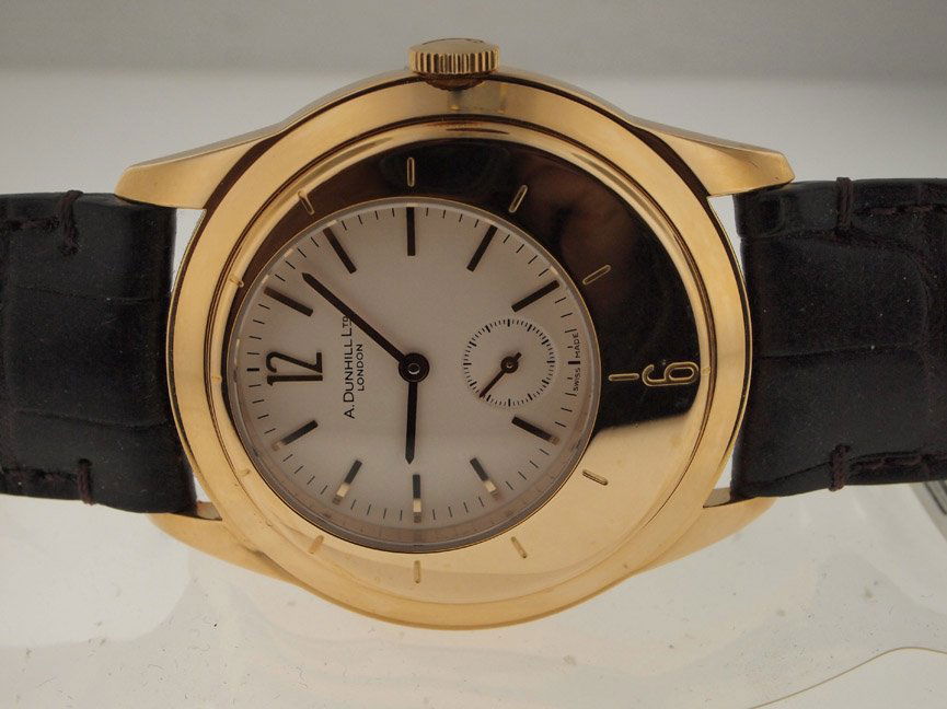 Dunhill By Cartier 18k Gold RARE Skeleton Mechanical Wa: Dunhill By Cartier 18k Gold RARE Skeleton Mechanical Watch. Dunhill by Cartier, 18k Gold, Manual Wind Mechanical, Rare Limited Edition of 250, Leather Strap, Swiss Made.