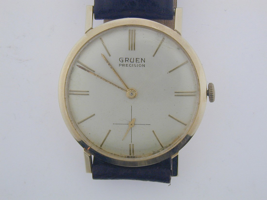Vintage Gruen Gents watch: Lower second hand Swiss wind movement Dark brown leather strap 14k YG