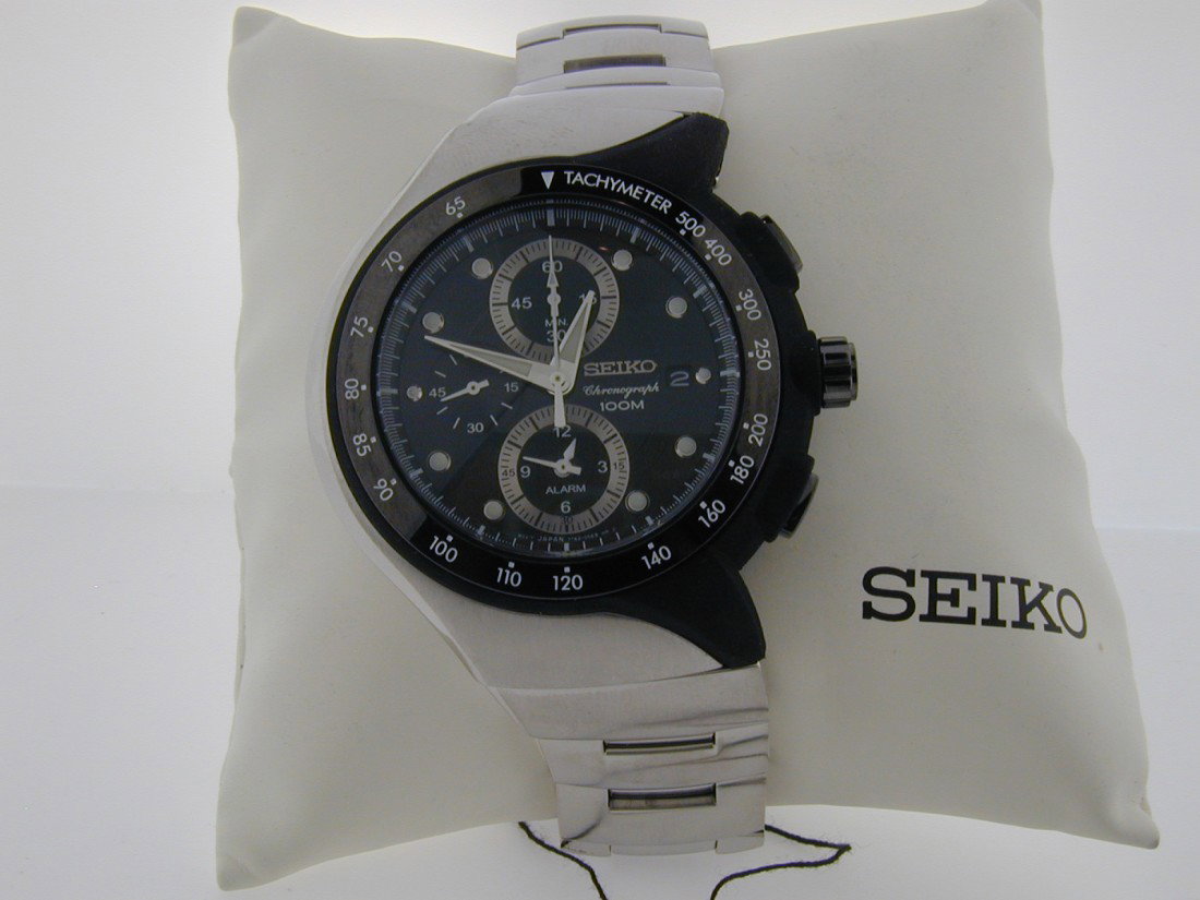 Seiko Chronograph 100m Dive watch New with Tags: Stainless steel Bracelet 44mm stainless Case with Black Composite Tachymeter Dial Seiko 100m Dive watch New with Box and tags