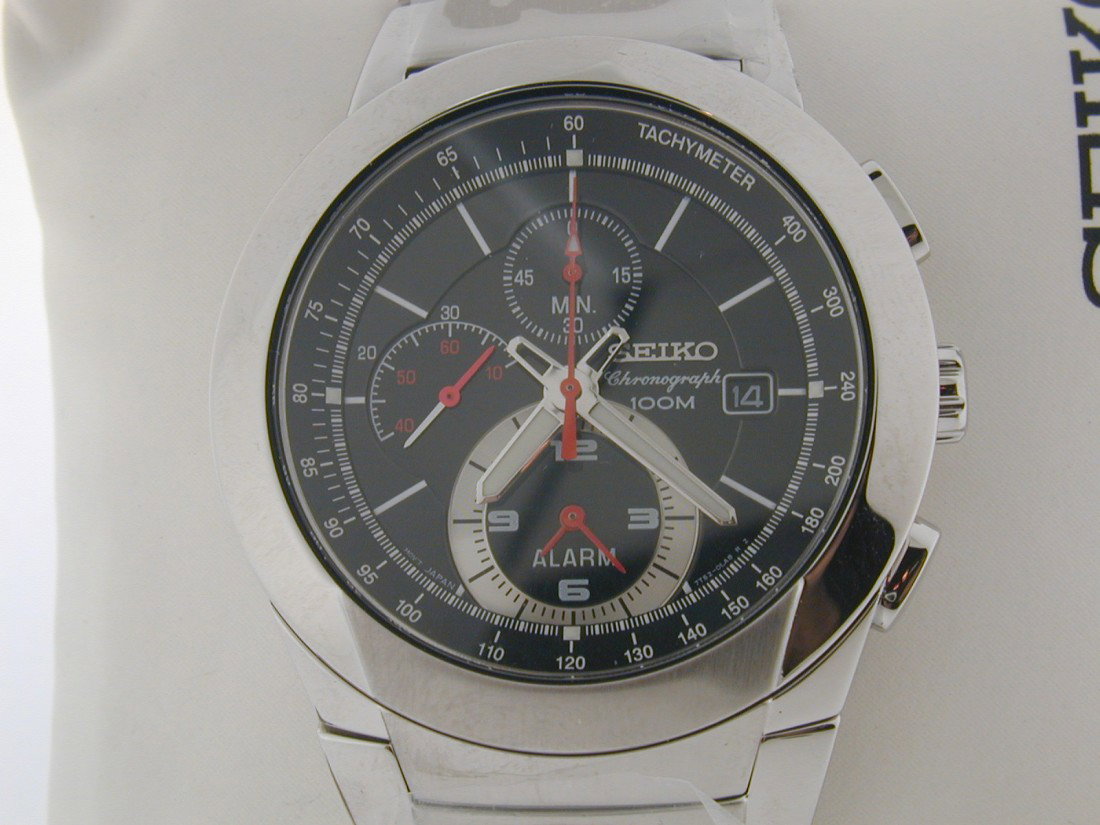 Seiko Chronograph Mens watch: 100M, New in box, Still has the protective plastic around it, Chronograph, Cal. 7t62, Stainless band