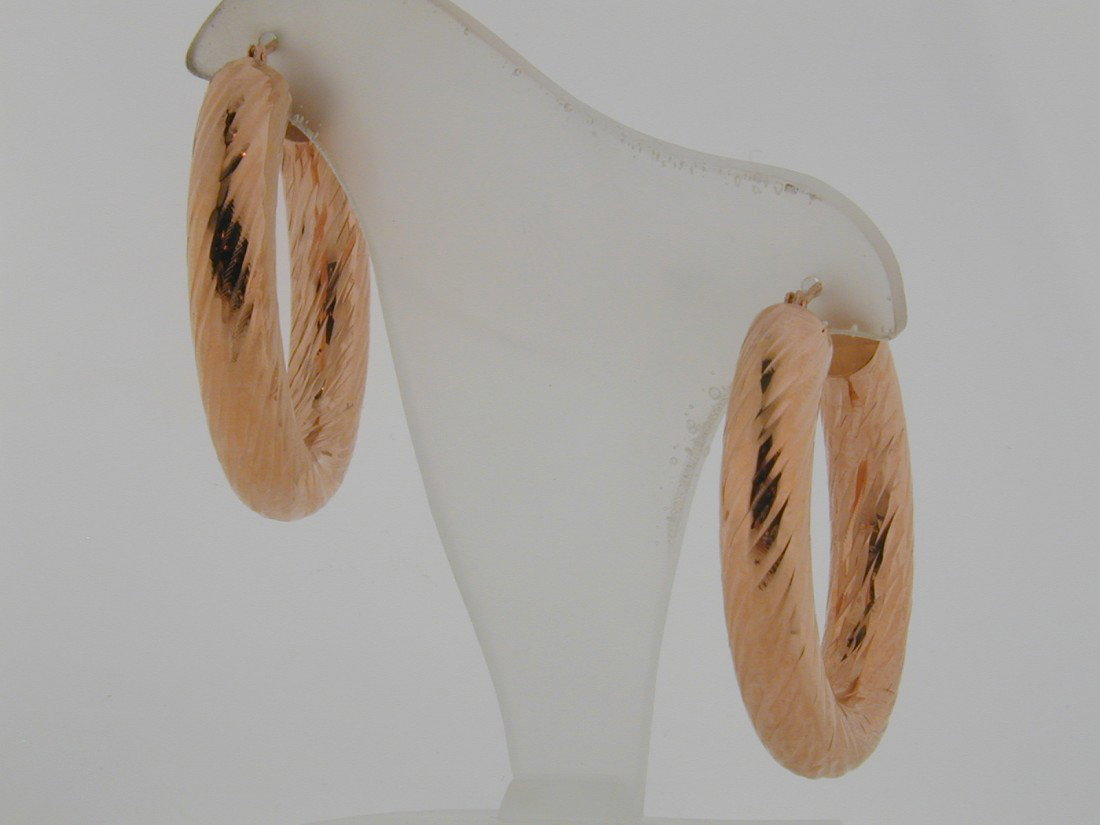 Fat elongated Diamond cut ROSE gold hoops: d/c 14k ROSE gold, 1.5" long 1.5dwt, small ding on back