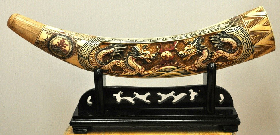 CHINESE HAND CARVED BONE VENEERED TUSK: CHINESE HAND CARVED BONE VENEERED TUSK ON WOOD STAND,