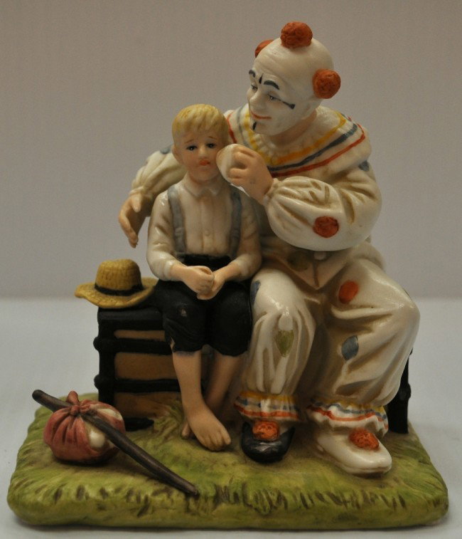 norman rockwell bisque porcelain clown: the innocence of youth collection selected by norman rockwell early edition favorites "the runaway" life magazine - june 1, 1922 hand crafted fine bisque porcelain clown figure