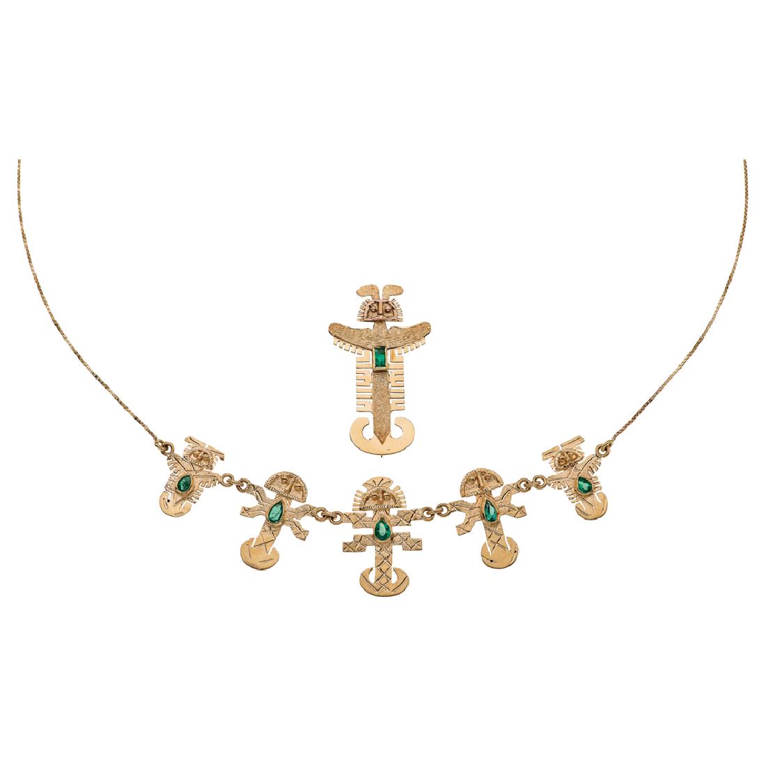 A 14K yellow gold choker and pendant/brooch with 6: A 14K yellow gold choker and pendant/brooch with 6 emeralds 0.80 carats.