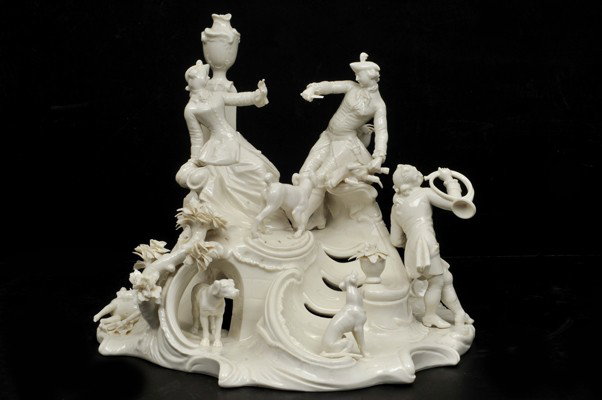 A porcelain figurine: Nymphenburg Glazed porcelain figurine representing a Romantic Scene. 30 x 30 cms