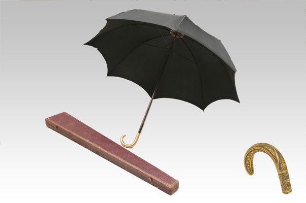 Antique Umbrella: A. Becarisse French Antique Unbrella. Black. With spare and case, decorated with damascene with leyend "Angel ortiz".