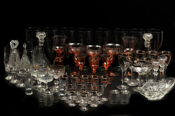 Different decorative objects made on cristal and gla: Vessels. Liqueur glasses. Horses. Drinking. Dishes. Candlesticks. Bells. Oilers. Liquor. Vases. Centerpieces