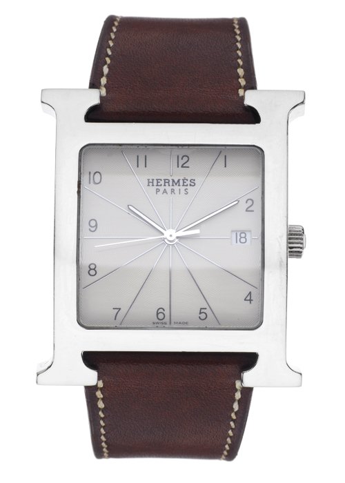 RELOJ HERMÃˆS HEURE. En acero y correa de piel cafÃ©.: RELOJ HERMÃˆS HEURE. En acero y correa de piel cafÃ©. Movimiento: cuarzo. Cuenta con estuche original.
