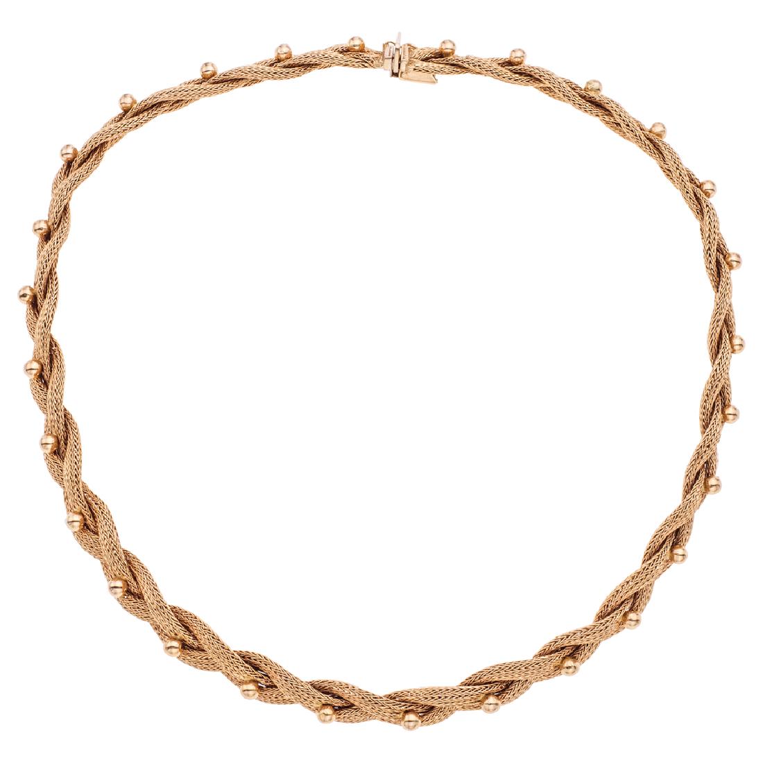 An 18K yellow gold choker. Weight: 54.6 g. (1 of 1)