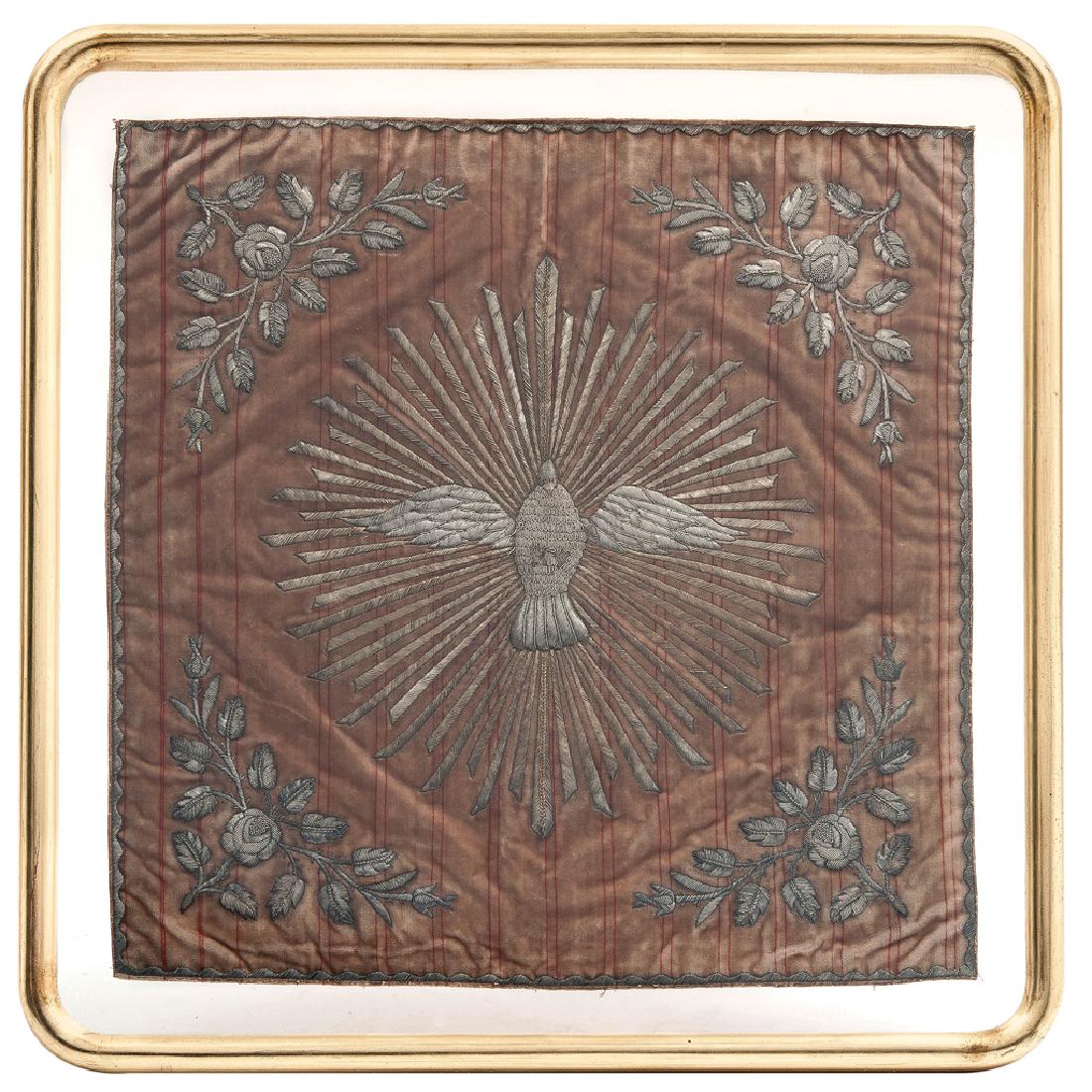 LITURGICAL ORNAMENT WITH AN ALLEGORY OF THE HOLY: LITURGICAL ORNAMENT WITH AN ALLEGORY OF THE HOLY SPIRIT. MEXICO, 19th CENTURY. Velvet with silver thread embroidery. 40 x 42 cm THIS LOT MAY HAVE EXPORTATION RESTRICTIONS. TAKE THIS INTO CONSIDERATION