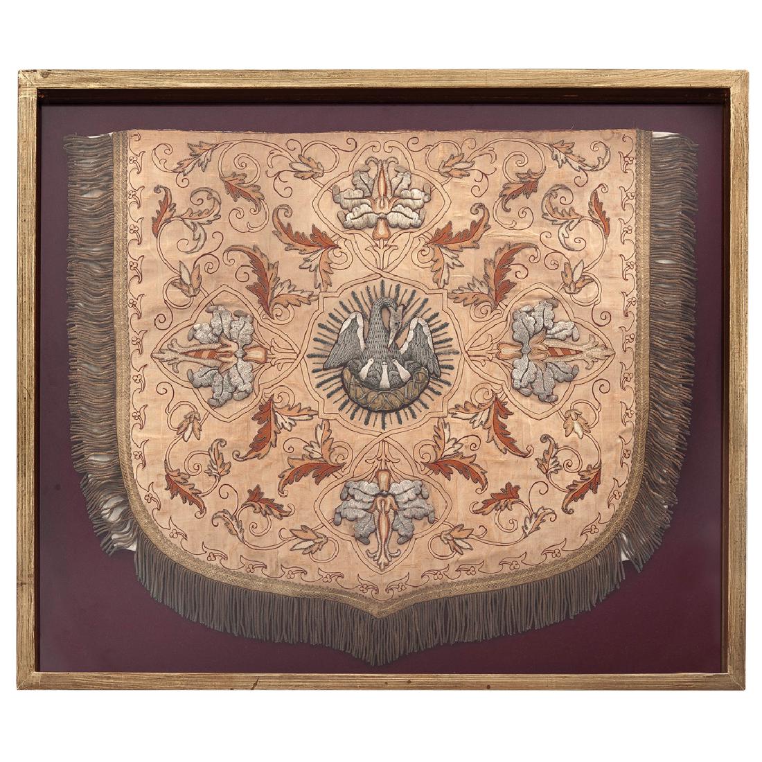 LITURGICAL ORNAMENT WITH AN ALLEGORY OF THE HOLY: LITURGICAL ORNAMENT WITH AN ALLEGORY OF THE HOLY COMMUNION. MEXICO, 19th CENTURY. Satin with metallic and silver thread embroidery. 54 x 60 cm