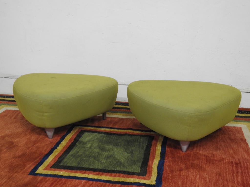 Pair of Vladimir Kagan Wedge Ottomans: Green upholstery on metal legs. Wear to fabric, otherwise in good condition. 16"H X 40"W X 33"D.