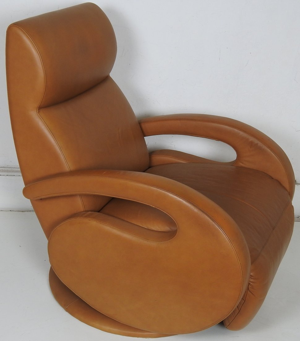 Italian Style Leather Lounge - Recliner: Tan leather on a swivel base. Made by the \" American Leather Co.\". Minor wear to leather, otherwise in good condition. 40\"H X 29\"W X 36\"D. Fully reclined depth 62".