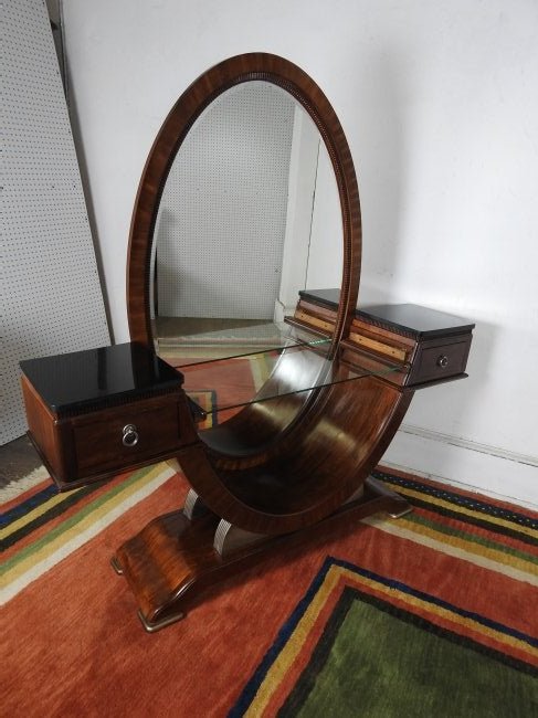 Art Deco Style Vanity and Stool: Walnut veneer with marble top ends, oval mirror and pull out glass tray, along with a lift lid bench. in good condition. 68"H X 66 1/4"W X 15 1/4"D. Bench 18 1/2"H X 20"D.