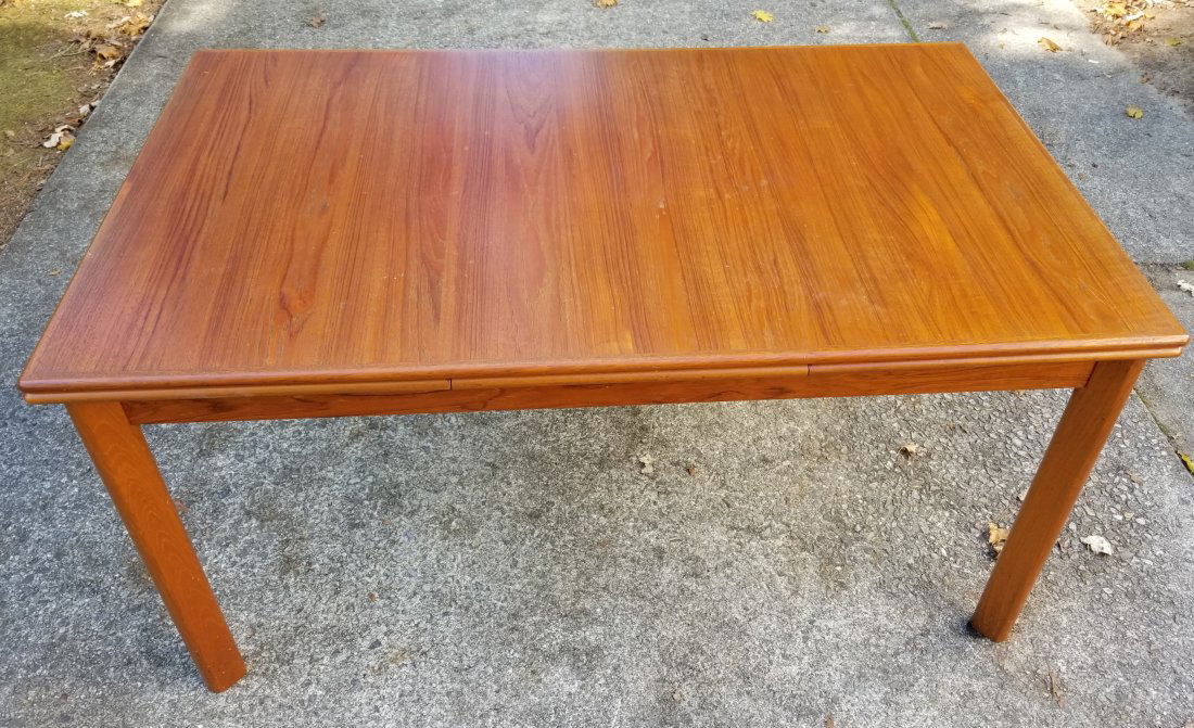 Danish Teak Dining Table BRDR. Furbo: Teak with 2 pullout leaves. Minor wear to finish, otherwise good condition. 29"H X 58 3/4"W X 35 3/4"D.Labeled BRDR. Furbo, Made in Denmark