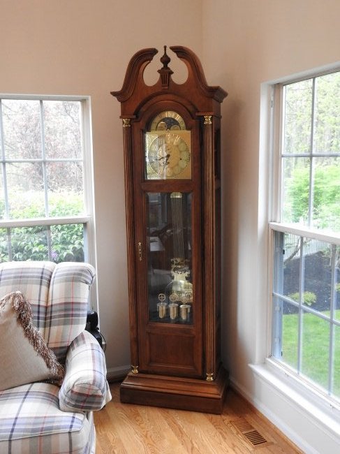 HOWARD MILLER GRANDFATHER CLOCK: In good condition.