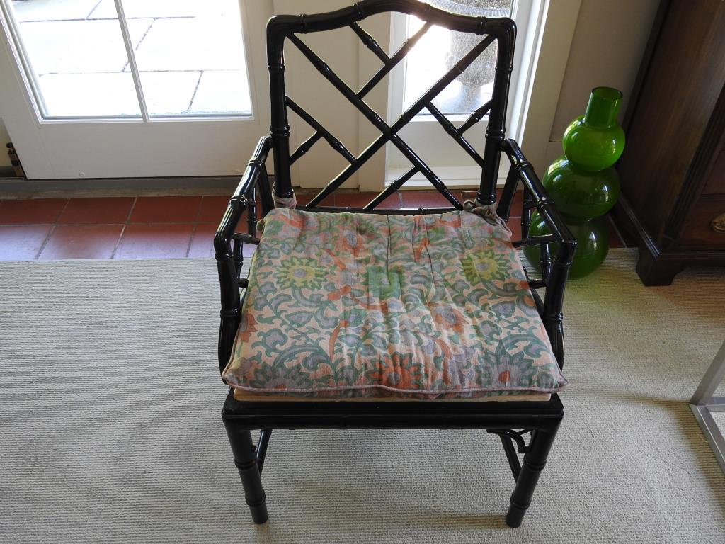 Faux Bamboo Arm Chair: Faux bamboo embonized arm chair. Chair is in good condition. Measurements are 35"x24"x18" qith a seat height of 18 1/2".