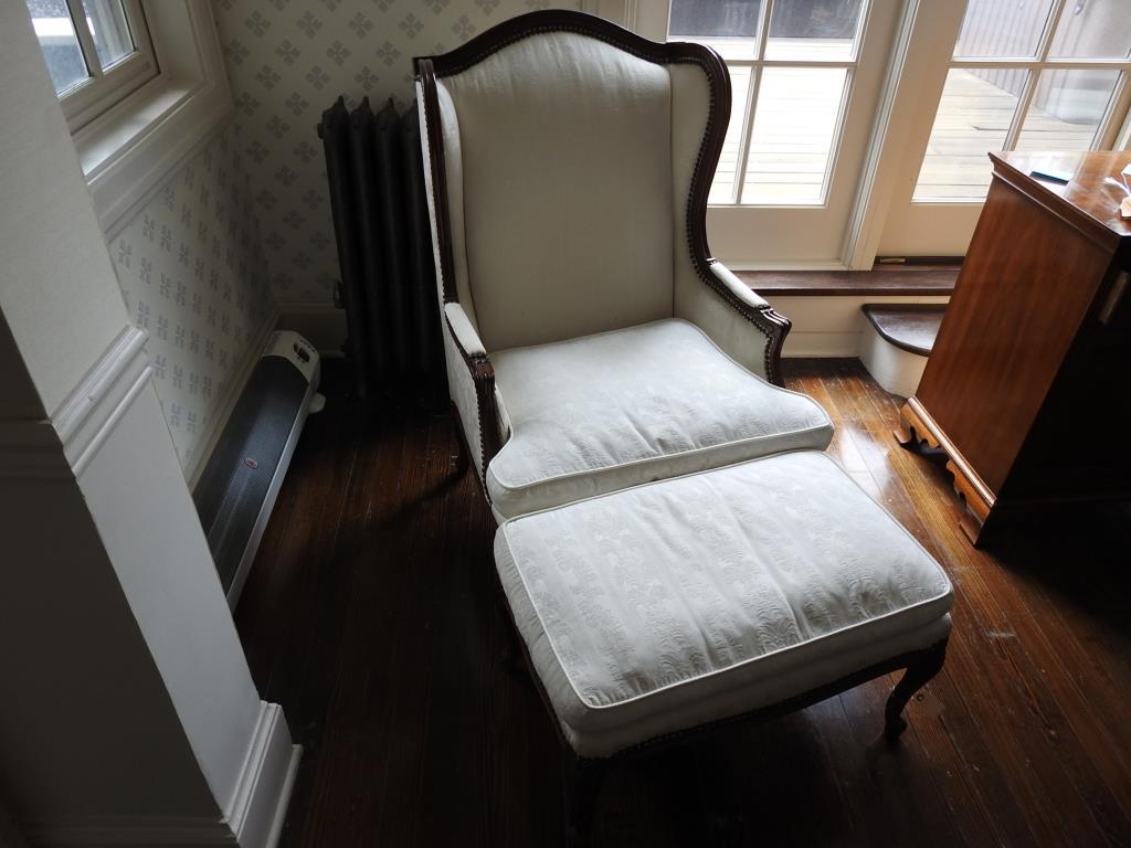 French Wing Chair And Ottoman: French wing chair and ottoman in good condition. Chair measurements are 43"x28"26" with a seat height of 15".