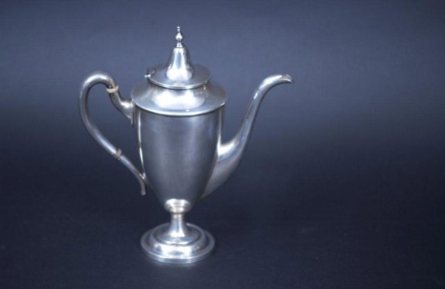 1 Watson Co. Sterling Silver Teapot: 1 Watson Co. Sterling Silver Teapot. (minor denting on base, surface scratches and imperfections). 12.36 TO.