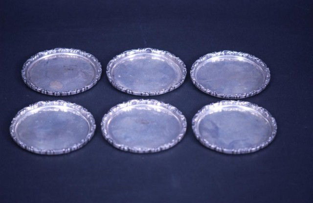 6 Sterling Silver Coasters: 6 Sterling Silver Coasters, Sanborn's Mexico (surface scratches and imperfections). 13.00 TO.