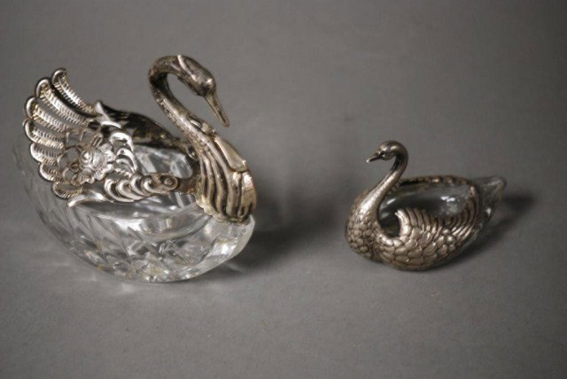 2 SS MOUNTED & CRYSTAL SWANS: 2 Sterling Silver Mounted and Crystal Swans, 1-large, marked Sterling on the wind, 4-1/2" x 5", 1-Black, Starr & Frost, 2-1/2" x 3-1/2".
