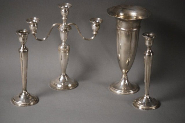 4 ASSORTED STERLING SILVER ITEMS: 4 Assorted Sterling Silver Items, 1-Preisner weighted vase, 11" tall, 1-3 arm weighted candelabra, 2-weighted candlesticks, minor damage and repairs to the candelabra and candlesticks.