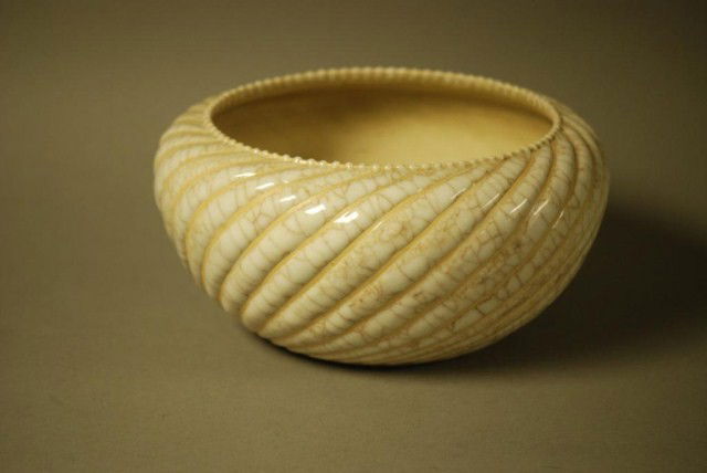 ANTIQUE CHINESE CERAMIC BOWL: Antique Chinese Ceramic Bowl, twisted, reeded faux marble, lined decoration and intricate pattern on the base 9-1/2" diameter x 4-3/4" high, in good condition.