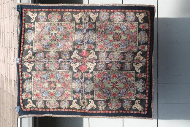 VICTORIAN TABLE COVER: Victorian Table Cover, black background, multi-colored floral stitch work, in good condition, 48' X 40".
