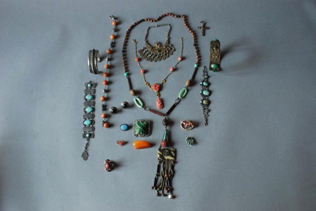 18 PC. JEWELRY LOT: 1-Asian necklace, 1-Coral color mounted necklace, 1-Amber color bead necklace, 2-turquoise color stone mounted bracelets, 2-coral color stone mounted pins, 1- Amber color pin, 1-Pr. ebony color stone