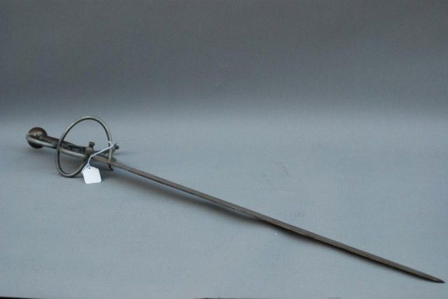 ANTIQUE SWORD: Made in Spain. 38" long and marked "Toledo". In good condition.