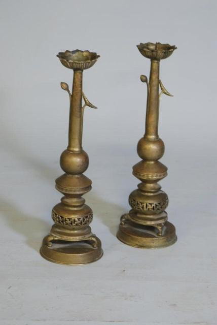 PR. ANTIQUE CHINESE ALTAR STIX: Bronze with turned and reticulated columns, 24-1/2"H x 7-1/2"D. Missing a point on top of one stick to mount a candle.