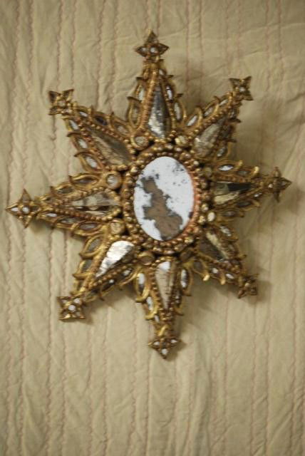 ANTIQUE ITALIAN SUNBURST MIRROR: Giltwood frame with antique distressed mirror, 28" x 28". Losses to mirror and gilding.