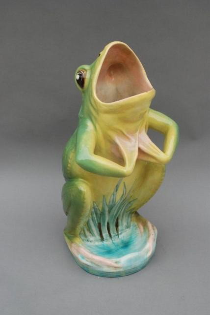 MAJOLICA UMBRELLA STAND: Frog-form, green back with yellow front flowing into green and blue base, signed on base Delphin Massler, Hallavris (H.M.), 28-1/2"H x 12"W x 11"D. Minor wear.